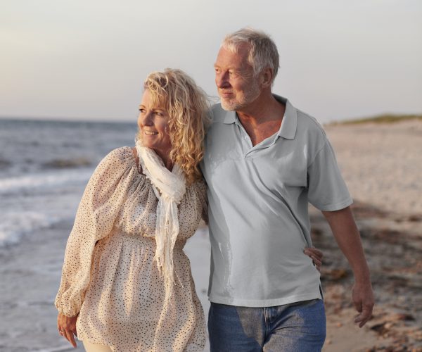 Sand landscape with blue sky, clouds and water